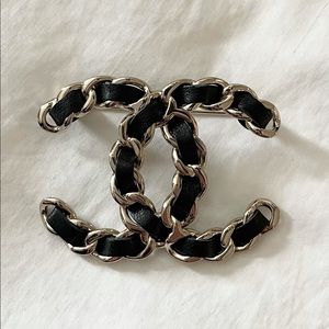 21K CHANEL lambskin leather brooch with gold tone hardware